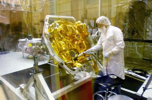 VANDENBERG AIR FORCE BASE, CALIF.- At Vandenberg Air Force Base, Calif., spacecraft functional testing is underway on the SciSat-1. The solar arrays are being attached and the communications systems are also being checked out.   The SciSat-1 weighs approximately 330 pounds and after launch will be p