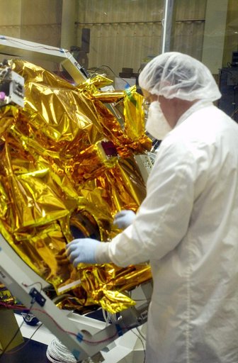 VANDENBERG AIR FORCE BASE, CALIF.- At Vandenberg Air Force Base, Calif., spacecraft functional testing is underway on the SciSat-1. The solar arrays are being attached and the communications systems are also being checked out.   The SciSat-1 weighs approximately 330 pounds and after launch will be p