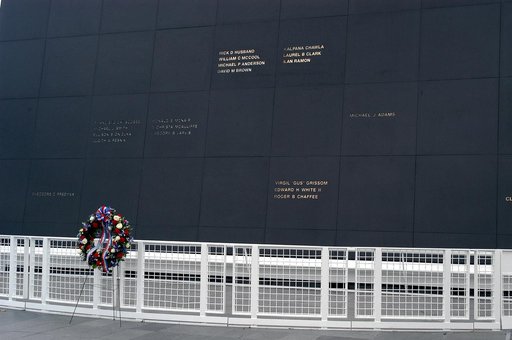 KENNEDY SPACE CENTER, FLA. -  A ceremonial wreath is placed at the Space Mirror Memorial at the Kennedy Space Center Visitor Complex.  During this dedication ceremony, the names of the STS-107 astronauts who lost their lives during the Columbia accident -- Rick Husband, Willie McCool, Laurel Clark, 