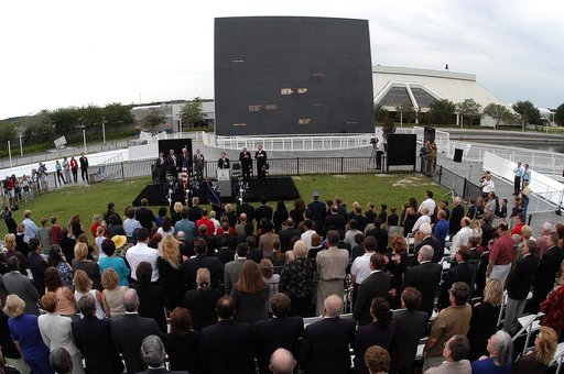 KENNEDY SPACE CENTER, FLA. -  Family members of the STS-107 astronauts and other dignitaries attend a dedication ceremony at the Space Mirror Memorial at the Kennedy Space Center Visitor Complex.  During this solemn event, the names of the STS-107 astronauts who lost their lives during the Columbia 