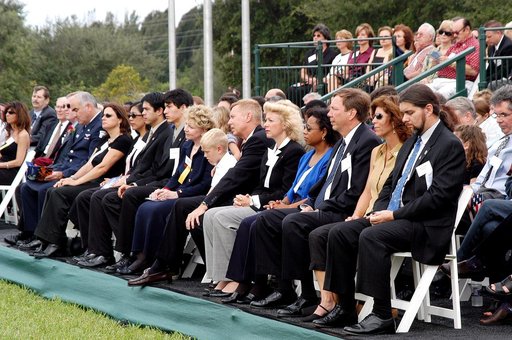 KENNEDY SPACE CENTER, FLA. -  Family members of the STS-107 astronauts and other dignitaries attend a dedication ceremony at the Space Mirror Memorial at the Kennedy Space Center Visitor Complex.  During this solemn event, the names of the STS-107 astronauts who lost their lives during the Columbia 