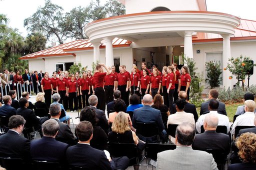 KENNEDY SPACE CENTER, FLA. -  Family members of the STS-107 astronauts and other dignitaries attending the Columbia Village dedication ceremony at the Florida Institute of Technology in Melbourne, Fla., enjoy a rendition of "God Bless America" by the university's Players in Harmony.  Each of the sev