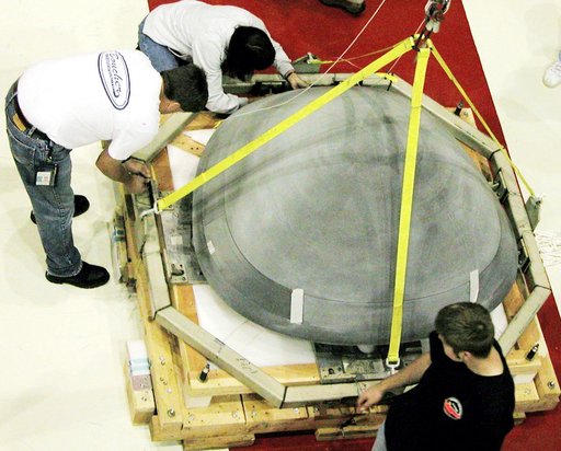 KENNEDY SPACE CENTER, FLA. -  In the Orbiter Processing Facility, the nose cap from Atlantis is secured on a shipping pallet.  The reinforced carbon-carbon (RCC) nose cap is being sent to the original manufacturing company, Vought in Ft. Worth, Texas, a subsidiary of Lockheed Martin, to undergo non-