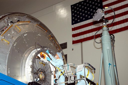 KENNEDY SPACE CENTER, FLA. - In the Space Station Processing Facility, a technician takes readings for pre-assembly measurements on the Japanese Experiment Module (JEM).  Developed by the Japan Aerospace Exploration Agency (JAXA), the JEM will enhance the unique research capabilities of the orbiting