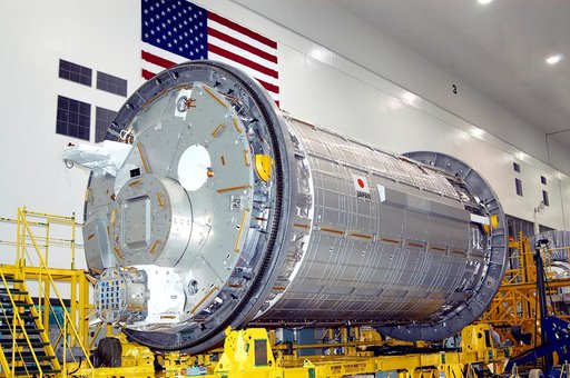 KENNEDY SPACE CENTER, FLA. - In the Space Station Processing Facility, the Japanese Experiment Module (JEM) rests on a workstand during pre-assembly measurement activities. Developed by the Japan Aerospace Exploration Agency (JAXA), the JEM will enhance the unique research capabilities of the orbiti