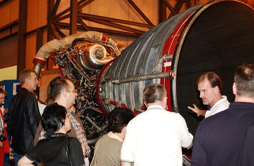 KENNEDY SPACE CENTER, FLA. - Members of the North American Treaty Organization (NATO) Parliamentary Assembly  get a close look at a Space Shuttle main engine in the Vehicle Assembly Building during their tour of KSC.   The Parliamentarians are meeting in Orlando this year for their 49th annual gathe