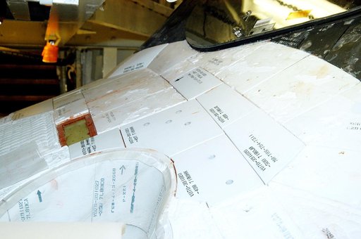 KENNEDY SPACE CENTER, FLA. - This view shows the tiles below the windshield on the orbiter Atlantis.  A gap test is being performed on the tiles as part of return-to-flight activities.  Atlantis is scheduled for mission STS-114, a return-to-flight test mission to the International Space Station.
