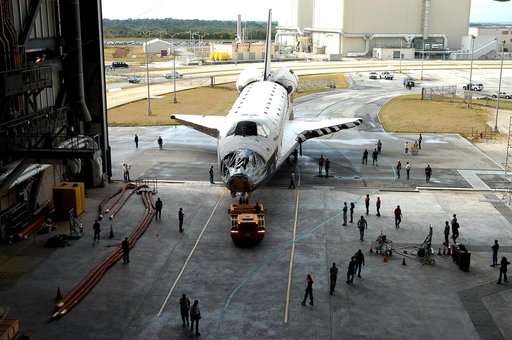 KENNEDY SPACE CENTER, FLA. - The Space Shuttle orbiter Atlantis moves into high bay 4 of the Vehicle Assembly Building (VAB).  It was towed from the Orbiter Processing Facility (OPF) to allow work to be performed in the bay that can only be accomplished while it is empty. Work scheduled in the proce