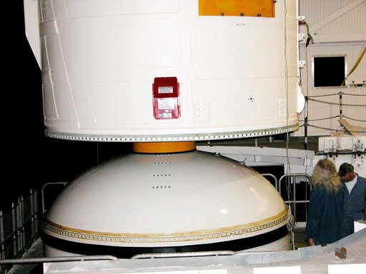 KENNEDY SPACE CENTER, FLA. -  In the Vehicle Assembly Building, the forward assembly (nose cap and frustum) is moved away from the solid rocket booster (SRB).  The destacking is part of time and cycle activities.  The SRB was part of the stack on Atlantis originally scheduled for a March 1, 2003, la