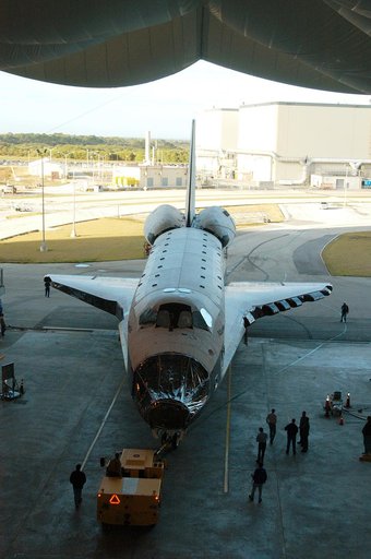 KENNEDY SPACE CENTER, FLA. -- The orbiter Atlantis is backed out of the Vehicle Assembly Building for transfer back to the Orbiter Processing Facility.  Atlantis spent 10 days in the VAB to allow work to be performed in the OPF that can only be accomplished while the bay is empty. Work included annu