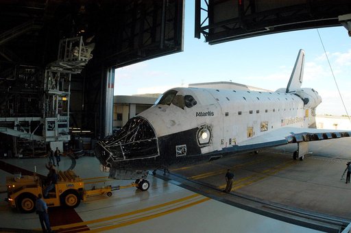KENNEDY SPACE CENTER, FLA. -  The orbiter Atlantis rolls into the Orbiter Processing Facility after spending 10 days in the Vehicle Assembly Building.  The hiatus in the VAB allowed work to be performed in the OPF that can only be accomplished while the bay is empty. Work included annual validation 