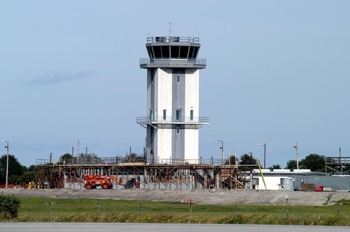 KENNEDY SPACE CENTER, FLA. -- A new control tower is nearing completion at the KSC Shuttle Landing Facility.  It will replace the old tower in use since 1987.   The old tower stands only 20 feet above the runway surface, too low to see the launch pads to the east. During nighttime landing operations
