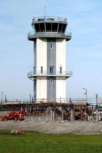 KENNEDY SPACE CENTER, FLA. -- A new control tower is nearing completion at the KSC Shuttle Landing Facility.  It will replace the old tower in use since 1987.   The old tower stands only 20 feet above the runway surface, too low to see the launch pads to the east. During nighttime landing operations