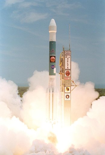 KENNEDY SPACE CENTER, FLA. -    The Delta II rocket with its Mars Exploration Rover (MER-A) payload breaks forth from the smoke and steam into the blue sky to begin its journey to Mars.  Liftoff occurred on time at 1:58 p.m. EDT from Launch Complex 17-A, Cape Canaveral Air Force Station.  MER-A, kno