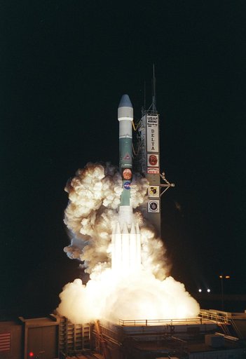 KENNEDY SPACE CENTER, FLA. - From a burst of fire and smoke, the Delta II launch vehicle races into the sky carrying the second Mars Exploration Rover, Opportunity.  The bright glare briefly illuminated Florida Space Coast beaches.  Opportunity’s dash to Mars began with liftoff at 11:18:15 p.m. East