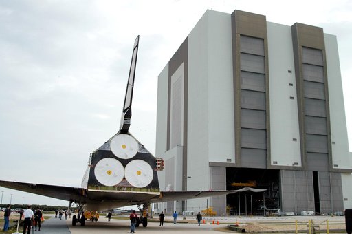 KENNEDY SPACE CENTER, FLA. -- Endeavour is towed toward the Vehicle Assembly Building for temporary storage.  The orbiter has been moved from the Orbiter Processing Facility (OPF) to allow work to be performed in the OPF that can only be accomplished while the bay is empty. Work scheduled in the OPF