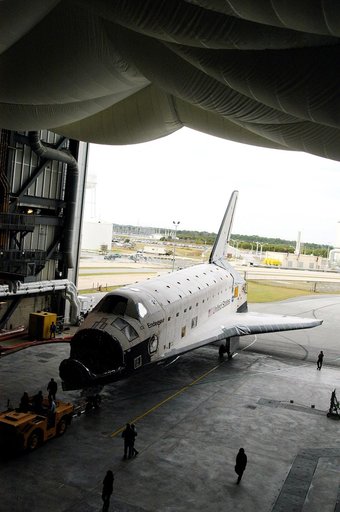 KENNEDY SPACE CENTER, FLA. -- Endeavour rolls into the Vehicle Assembly Building (VAB) for temporary storage.  The orbiter has been moved from the Orbiter Processing Facility (OPF) to allow work to be performed in the OPF that can only be accomplished while the bay is empty. Work scheduled in the OP