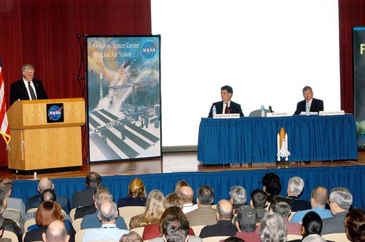 KENNEDY SPACE CENTER, FLA. -- Center Director Jim Kennedy introduces U.S. Reps. Dave Weldon and Tom Feeney in a Town Hall meeting at KSC.  Weldon and Feeney commented on the new mission for NASA outlined by President George W. Bush Jan. 14.  The congressmen and Kennedy also answered questions from e