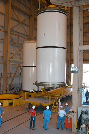 KENNEDY SPACE CENTER, FLA. -  In the Rotation Processing and Surge Facility, an SRB solid segment is being moved to a rail car for shipment to Utah for testing.  The segment was part of the STS-114 stack.  It is the first time actual flight segments that had been stacked for flight in the VAB are be