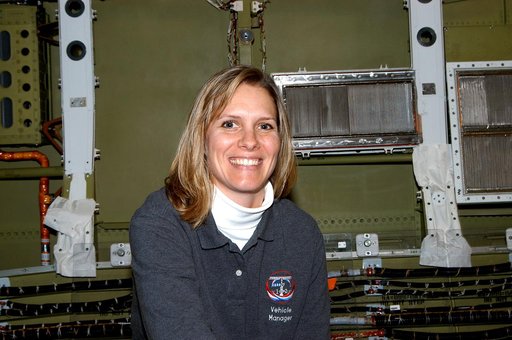 KENNEDY SPACE CENTER, FLA. -  NASA Vehicle Manager for Discovery, Stephanie Stilson poses for a photo after working with a KSC Web team who were filming a special feature for the KSC Web.  Stilson explained her role in the recent Orbiter Major Modification period, which included inspection, modifica