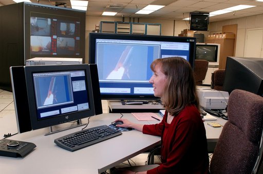 KENNEDY SPACE CENTER, FLA. - One of the world’s highest performing visual film analysis systems, developed to review and analyze previous shuttle flight data (shown here) in preparation for the shuttle fleet’s return to flight, is being used today for another purpose.  NASA has permitted its use in 