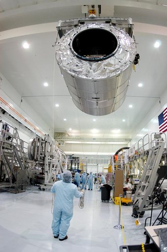 KENNEDY SPACE CENTER, FLA. - In the Space Station Processing Facility, the Multi-Purpose Logistics Module Raffaello glides above the floor as it moves to another stand on the other side.  Raffaello is the second MPLM built by the Italian Space Agency, serving as a reusable logistics carrier and prim