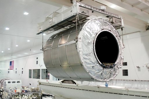 KENNEDY SPACE CENTER, FLA. - The Multi-Purpose Logistics Module Donatello is moved away from the payload canister in the Space Station Processing Facility.  Previously housed in the Operations and Checkout Building, Donatello was brought into the SSPF for routine testing.  This is the first time all