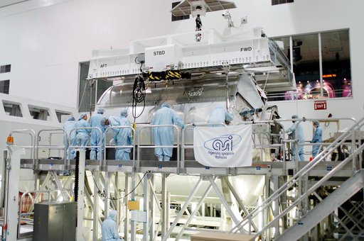 KENNEDY SPACE CENTER, FLA. - In the Space Station Processing Facility,  workers confirm the Multi-Purpose Logistics Module Donatello is safely in place on a work stand.  Previously housed in the Operations and Checkout Building, Donatello was brought into the SSPF for routine testing.  This is the f