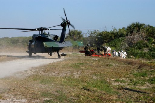 KENNEDY SPACE CENTER, FLA. - In a “Mode VII” emergency landing simulation at Kennedy Space Center, a helicopter crew helps “rescued” astronauts.  The purpose of Mode VII is to exercise emergency preparedness personnel, equipment and facilities in rescuing astronauts from a downed orbiter and providi