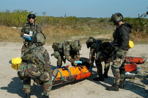 KENNEDY SPACE CENTER, FLA. - A helicopter rescue team prepares another “injured” astronaut for transportation to a local hospital.  They are all taking part in a “Mode VII” emergency landing simulation at Kennedy Space Center.  The purpose of the Mode VII is to exercise emergency preparedness person