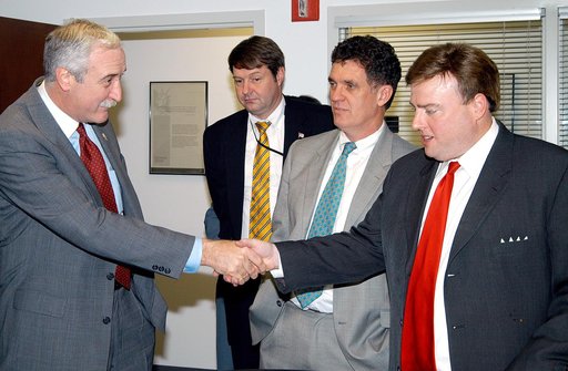 KENNEDY SPACE CENTER, FLA. - NASA Administrator Sean O’Keefe (left) greets U.S. Representative Ric Keller during a tour of the Central Florida Research Park, near Orlando.  Central Florida leaders are proposing the research park as the site for the new NASA Shared Services Center.  The center would 