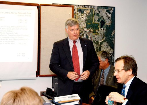KENNEDY SPACE CENTER, FLA. - KSC Director Jim Kennedy (center) makes a presentation to NASA and other officials about the benefits of locating NASA’s new Shared Services Center in the Central Florida Research Park, near Orlando.  Central Florida leaders are proposing the research park as the site fo