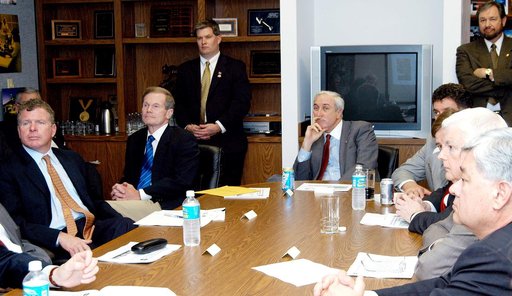 KENNEDY SPACE CENTER, FLA. - NASA officials and government representatives are gathered to learn about the assets of the Central Florida Research Park, near Orlando.  At the far end of the table is NASA Administrator Sean O’Keefe.  He is flanked, on the left, by Florida Congressman Tom Feeney and U.