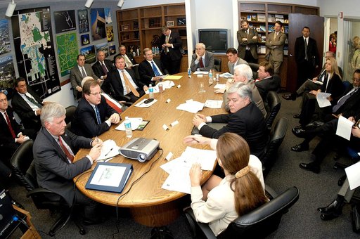 KENNEDY SPACE CENTER, FLA. - NASA and government officials are gathered to hear about the assets of the Central Florida Research Park, near Orlando, as the site of NASA’s new Shared Services Center.  Six sites around the U.S. are under consideration.  At the far end is NASA Administrator Sean O’Keef