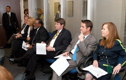 KENNEDY SPACE CENTER, FLA. - NASA and government officials are gathered to hear about the assets of the Central Florida Research Park, near Orlando, as the site of NASA’s new Shared Services Center.  Seated at right are Lisa Malone, director of KSC External Affairs, and Joel Wells, with the Governme