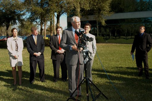 KENNEDY SPACE CENTER, FLA. - NASA Administrator Sean O’Keefe talks to the media at the Central Florida Research Park, near Orlando.  He and government officials were at the park for a presentation about the assets of the research park as the site of NASA’s new Shared Services Center. Behind O’Keefe 