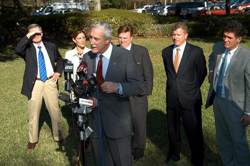 KENNEDY SPACE CENTER, FLA. - NASA Administrator Sean O’Keefe talks to the media at the Central Florida Research Park, near Orlando.  He and government officials were at the park for a presentation about the assets of the research park as the site of NASA’s new Shared Services Center. Behind O’Keefe 