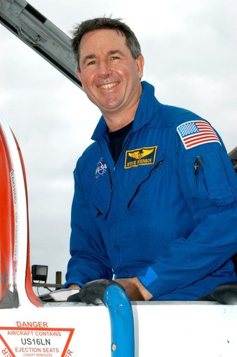 KENNEDY SPACE CENTER, FLA. - STS-114 Mission Specialist Stephen Robinson arrives at KSC aboard a T-38 jet aircraft.  He and other crew members are at the Center for familiarization activities with equipment.   The mission is Logistics Flight 1, scheduled to deliver the Multi-Purpose Logistics Module