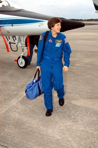KENNEDY SPACE CENTER, FLA. - STS-114 Mission Specialist Wendy Lawrence is pleased to be back at KSC after arriving aboard a T-38 jet aircraft.  She and other crew members are at the Center for familiarization activities with equipment.   The mission is Logistics Flight 1, scheduled to deliver the Mu