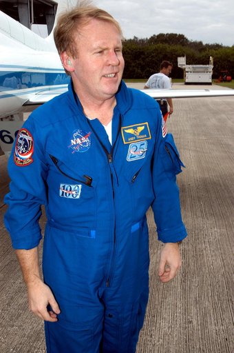 KENNEDY SPACE CENTER, FLA. - STS-114 Mission Specialist Andrew Thomas is pleased to be back at KSC after arriving aboard a T-38 jet aircraft.  He and other crew members are at the Center for familiarization activities with equipment.   The mission is Logistics Flight 1, scheduled to deliver to the S