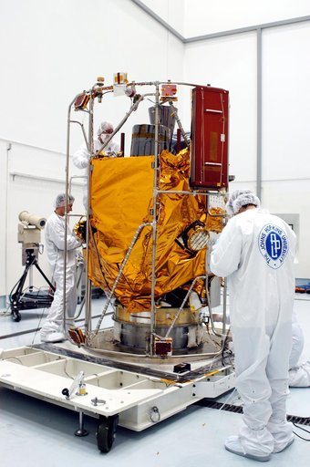 KENNEDY SPACE CENTER, FLA. -  In the high bay clean room at the Astrotech Space Operations processing facilities near KSC, NASA’s MESSENGER spacecraft is revealed.  Employees of the Johns Hopkins University Applied Physics Laboratory, builders of the spacecraft, will perform an initial state-of-heal