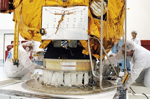 KENNEDY SPACE CENTER, FLA. -  In the high bay clean room at the Astrotech Space Operations processing facilities near KSC, workers prepare NASA’s MESSENGER spacecraft for transfer to a work stand.  There employees of the Johns Hopkins University Applied Physics Laboratory, builders of the spacecraft