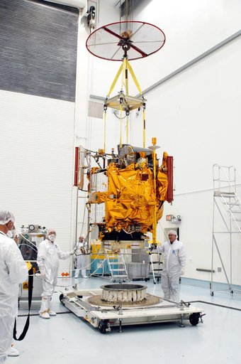KENNEDY SPACE CENTER, FLA. -  At the Astrotech Space Operations processing facilities, NASA’s MESSENGER spacecraft is lifted off the pallet for transfer to a work stand. There employees of the Johns Hopkins University Applied Physics Laboratory, builders of the spacecraft, will perform an initial st
