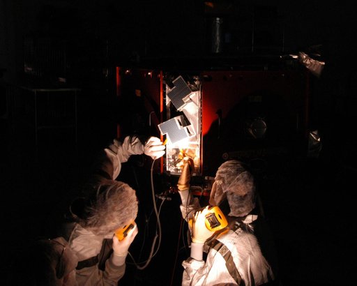 Inspection work on THEMIS at Astrotech