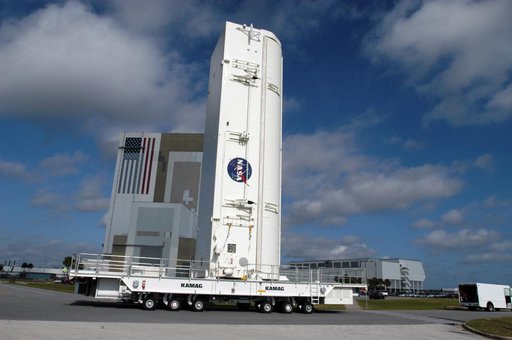 Payload Bay Canister being transported to Pad 39A for a fit chec