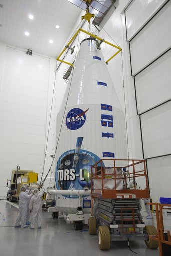 TDRS-L Spacecraft is Lifted Onto Transporter