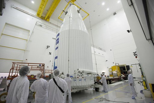 TDRS-L Spacecraft is Lifted Onto Transporter