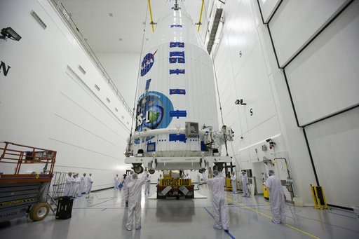 TDRS-L Spacecraft is Lifted Onto Transporter