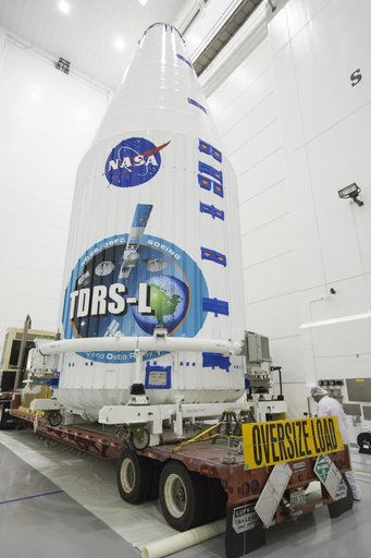 TDRS-L Spacecraft is Lifted Onto Transporter