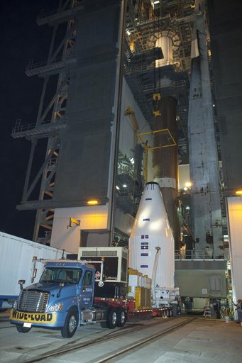 TDRS-L spacecraft lift to mate on Atlas V